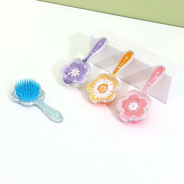 Imagen de CEPILLO PARA EL CABELLO CON BOLSA DE AIRE