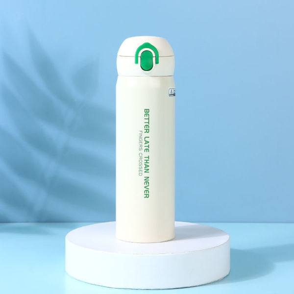 Imagen de TERMO CON TAPA ABATIBLE DE MODA (BLANCO) 480 ML
