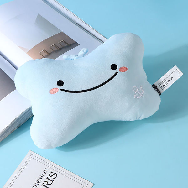 Imagen de ALMOHADA CON FORMA DE HUESO DE BALLENA